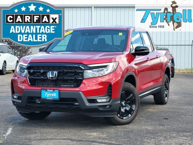 2025 Honda Ridgeline Black Edition in Red — front three-quarter view