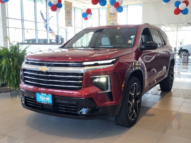 2026 Chevrolet Traverse High Country in Radiant Red Tintcoat — front three-quarter view