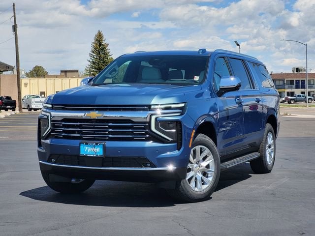 2026 Chevrolet Suburban Premier in Lakeshore Blue Metallic — front three-quarter view