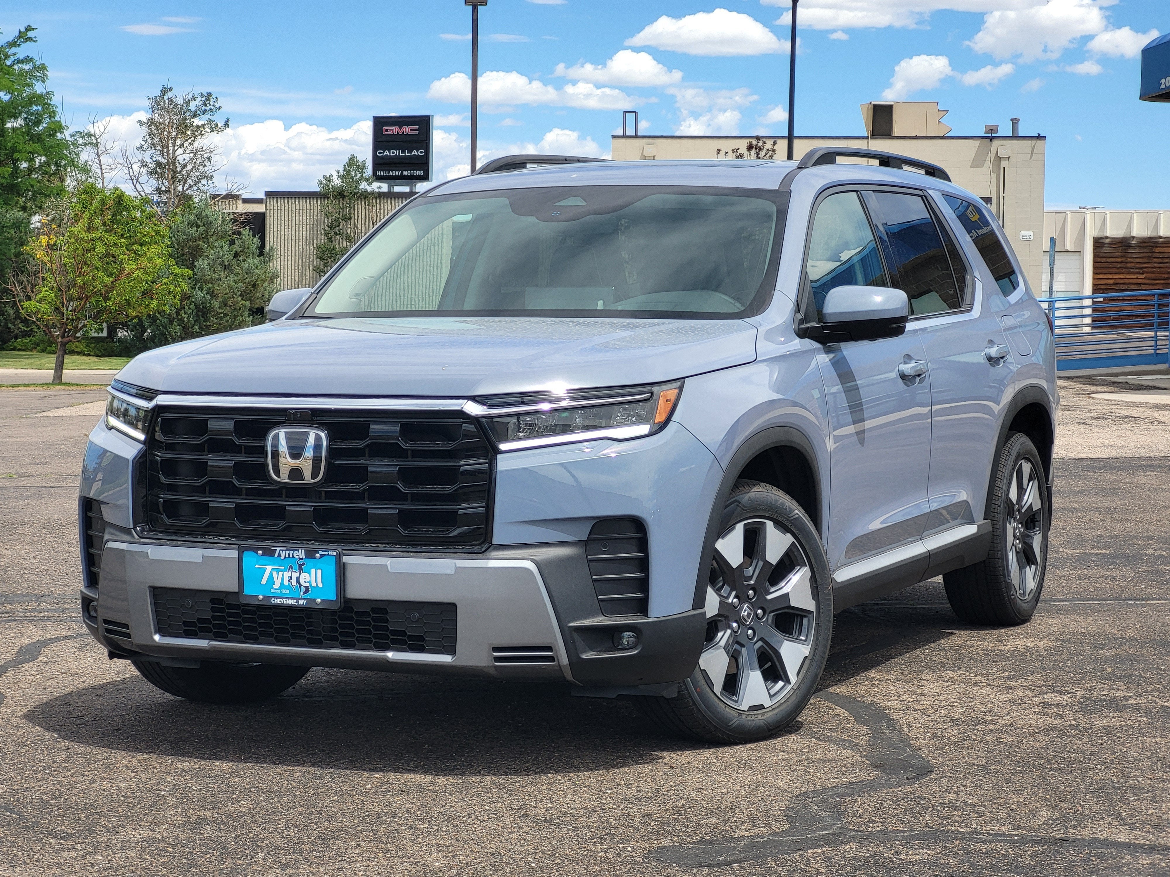 2026 Honda Pilot Elite in Sonic Gray Pearl — front three-quarter view