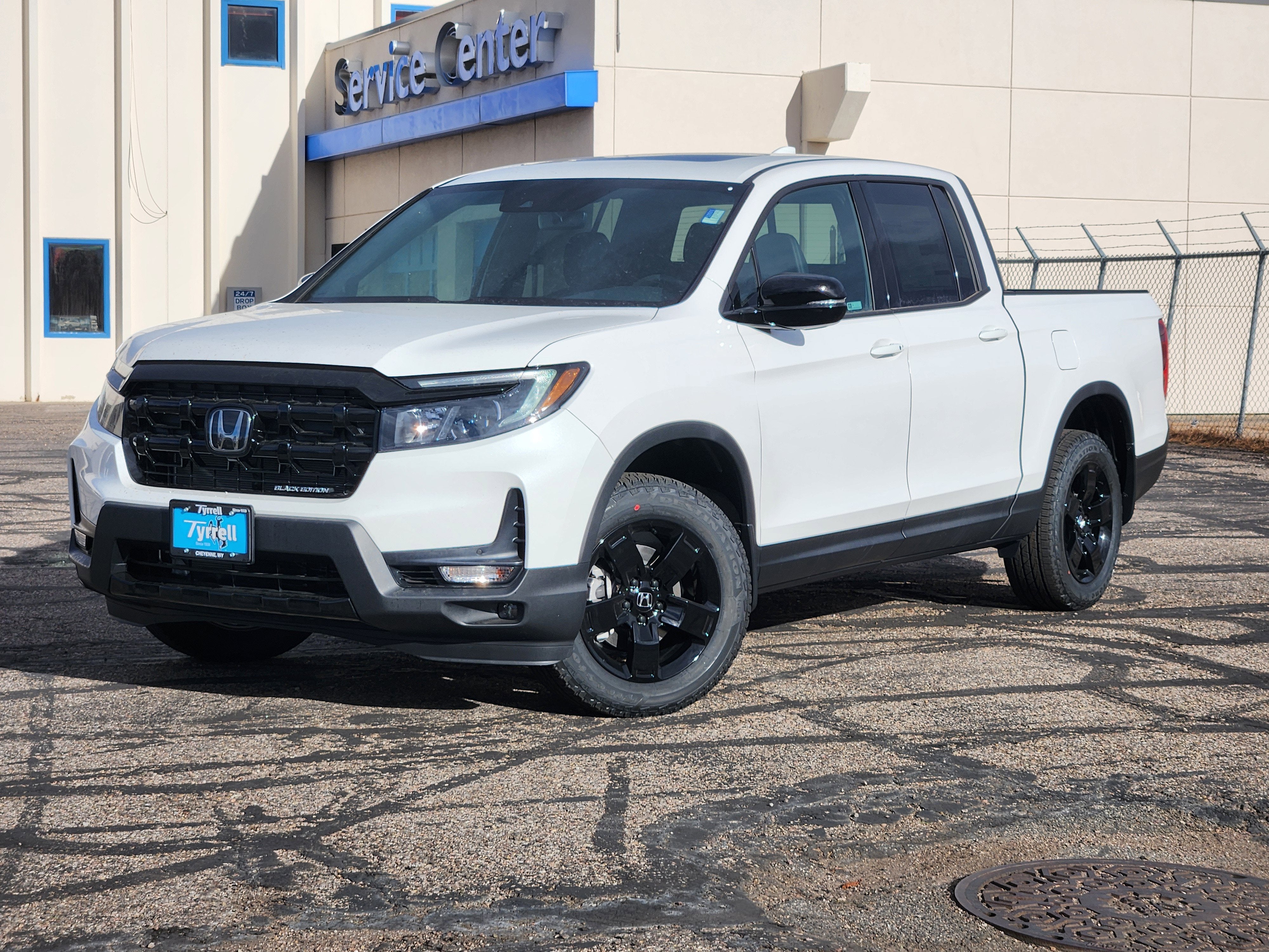 2026 Honda Ridgeline Black Edition in Platinum White Pearl — front three-quarter view